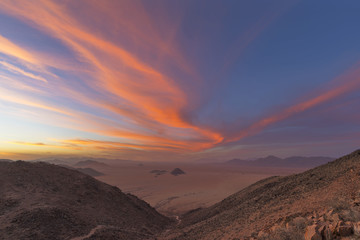 Red colored clouds at sunset