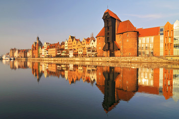 Fototapeta na wymiar Pomerania Gdansk the historic Quayside (Dlugie Pobrzeze) of the old harbour and the medieval wooden port crane, Poland Eastern.