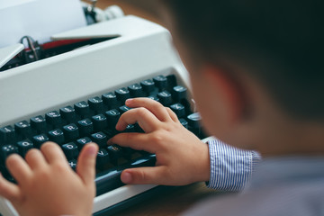 Boy with typewriter