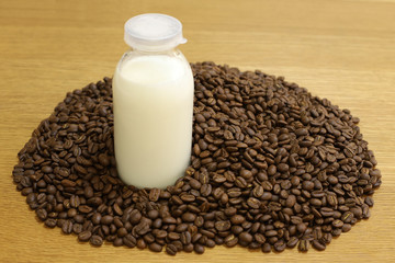 Fresh milk with roasted coffee beans
