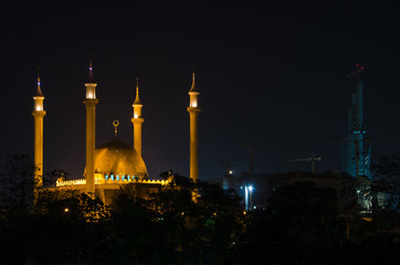 Fototapeta na wymiar The National Mosque of Abuja illuminated during the night