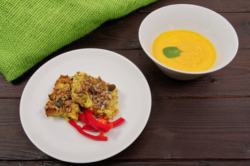 Azuki with vegetables on steam on a table