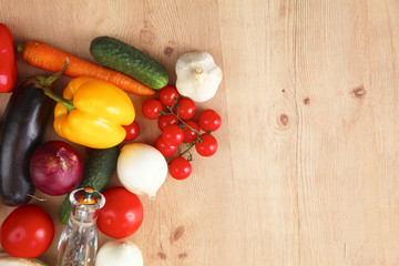 Fototapeta na wymiar Pile of organic vegetables on a wooden table