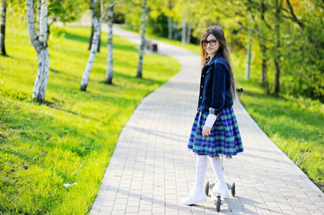 Kid girl in spring park