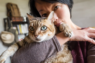 woman hold cat