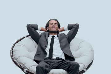 businessman resting in a comfortable chair