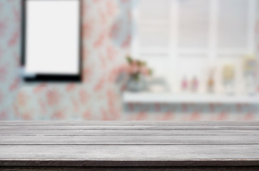 Selected focus empty brown wooden table and Coffee shop blur background with bokeh image. for your photomontage or product display