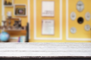 Selected focus empty brown wooden table and Coffee shop blur background with bokeh image. for your photomontage or product display