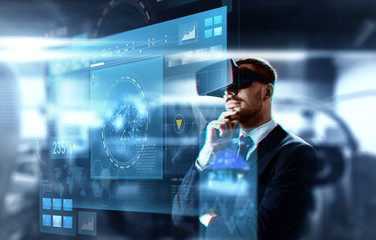 business, augmented reality and future technology concept - businessman in virtual headset and...