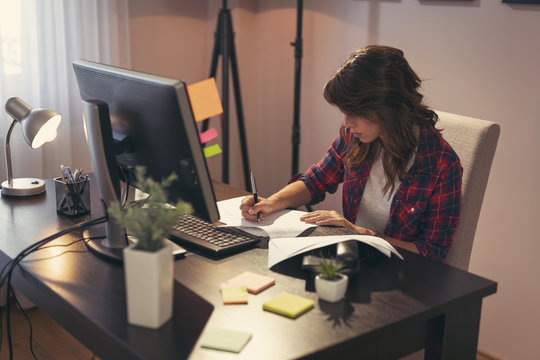 Young woman working in a home office