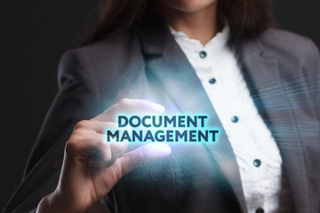 The concept of business, technology, the Internet and the network. A young entrepreneur working on a virtual screen of the future and sees the inscription: Document management