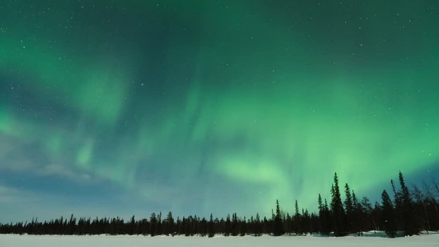 Time lapse of Aurora Borealis (Northern Lights) over lake Pallasjärvi in Pallas-Yllästunturi National Park, Lapland, Finland