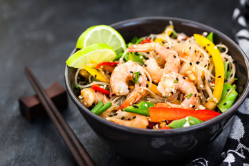 Delicious asian rice glass noodles with prawns and vegetables  (wok)