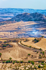 Landscape of valley with fires fields Enna in Morgantina Sicily