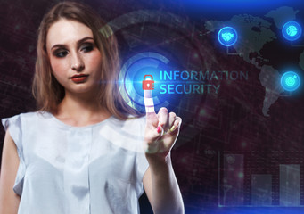 The concept of business, technology, the Internet and the network. A young entrepreneur working on a virtual screen of the future and sees the inscription: Information security