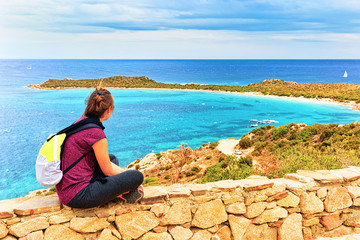 Girl at Punta Coda Cavallo seen from San Teodoro Sardinia
