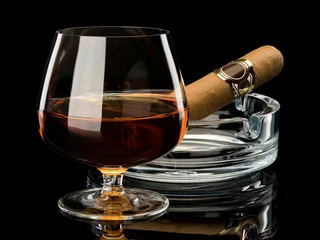Room darkening curtains Alcohol Cognac and cigar in a glass ashtray