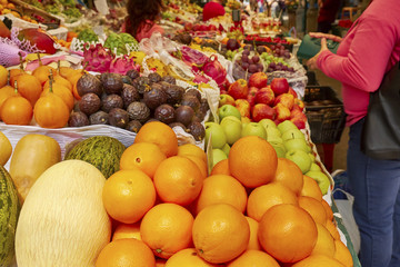 Fresh fruits and vegetables, The buyer chooses fruit on the market