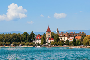 Fototapeta na wymiar Chateau Ouchy and Lake Geneva quay Lausanne