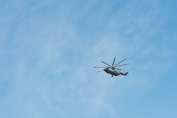 Fototapeta na wymiar Moscow, Russia. May 9, 2018. Military helicopter against the blue sky