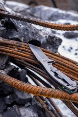 Kind of knife from behind. Photo at an angle. Vertical shot.