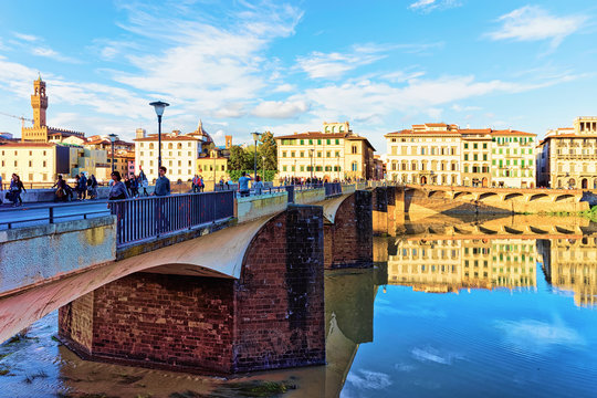 People at Ponte alle Grazie bridge in Florence