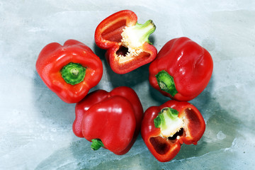 Fresh red bell pepper on grey background. raw vegetable