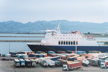 Waggons of vans in port in Cagliari