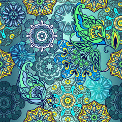 Seamless pattern with mandala and fantastic flowers with paisley. Floral wallpaper. Decorative ornament for fabric, textile, wrapping paper.