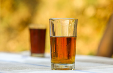 The Cold Soft Drink in Glass on Bright Background