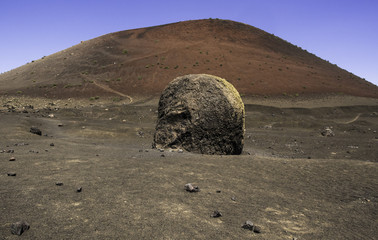volcanic bomb at the base of the volcano Montana Colorada