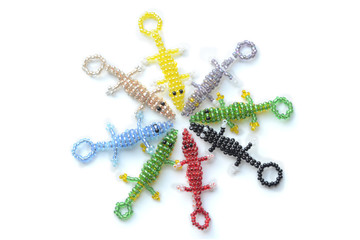 A circle of crocodiles. Products from beads. Crocodiles in the technique of weaving with beads. Alligators of different colors