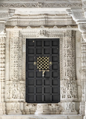 The Closed Wooden Door of An Ancient Jainism Temple in Ranakpur Village in Rajasthan, India