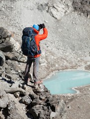 Silhouette of tourist on mountain