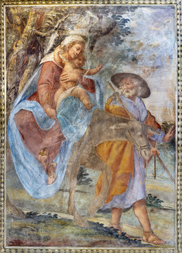 PARMA, ITALY - APRIL 16, 2018: The fresco of The Flight to Egypt in church Chiesa di Santa Croce by Giovanni Maria Conti della Camera (1614 - 1670).