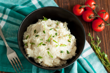 Mashed cauliflower with garlic and herbs © filirochka