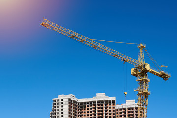 Concrete incomplete building under construction. Construction site.