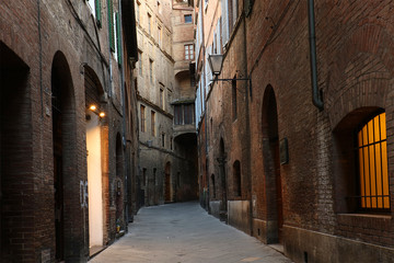 Fototapeta na wymiar Street in Siena, city declared by UNESCO a World Heritage Site