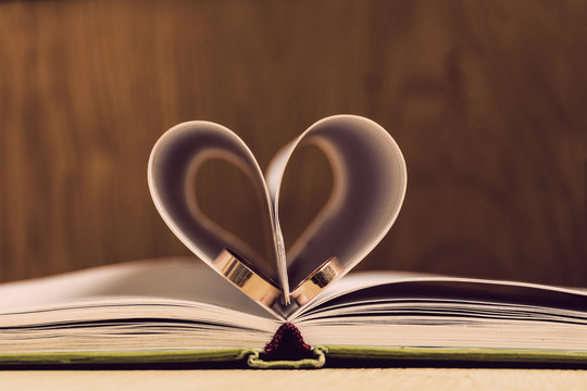 Book heart with rings,write your new love story,wedding