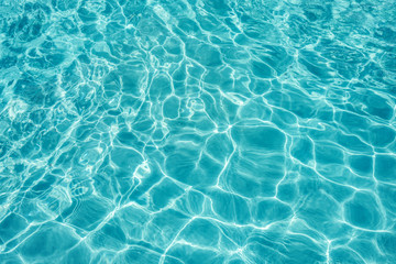 Background of clear turquoise pool water