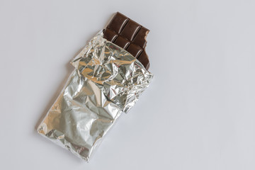 Dark chocolate bite bar in a foil.