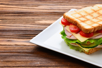 Sandwich bread tomato, lettuce and yellow cheese