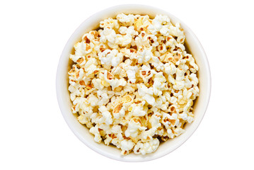 popcorn in a bowl on a dark wooden background