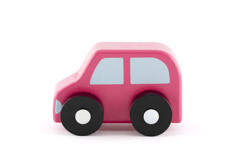 Small wooden toy car on white background with clipping path