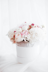 Bouquet of pink and white flowers.