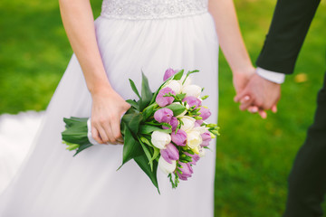 bride with wedding bouquet