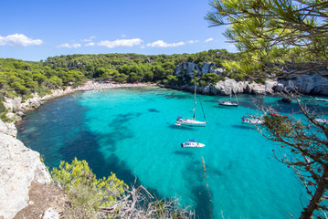Obraz na płótnie Canvas Boats and yachts on Macarella beach, Menorca, Spain
