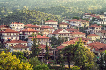 Litochoro view from castle to the city with buildings and road, Greece