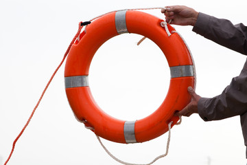 man holding life buoy
