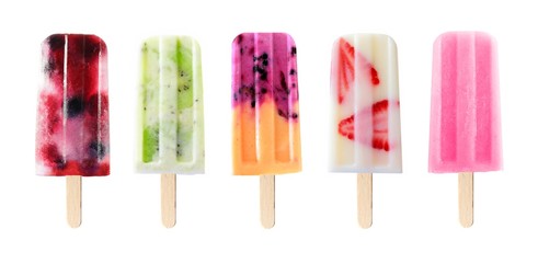 Assortment of fruit popsicles isolated on a white background